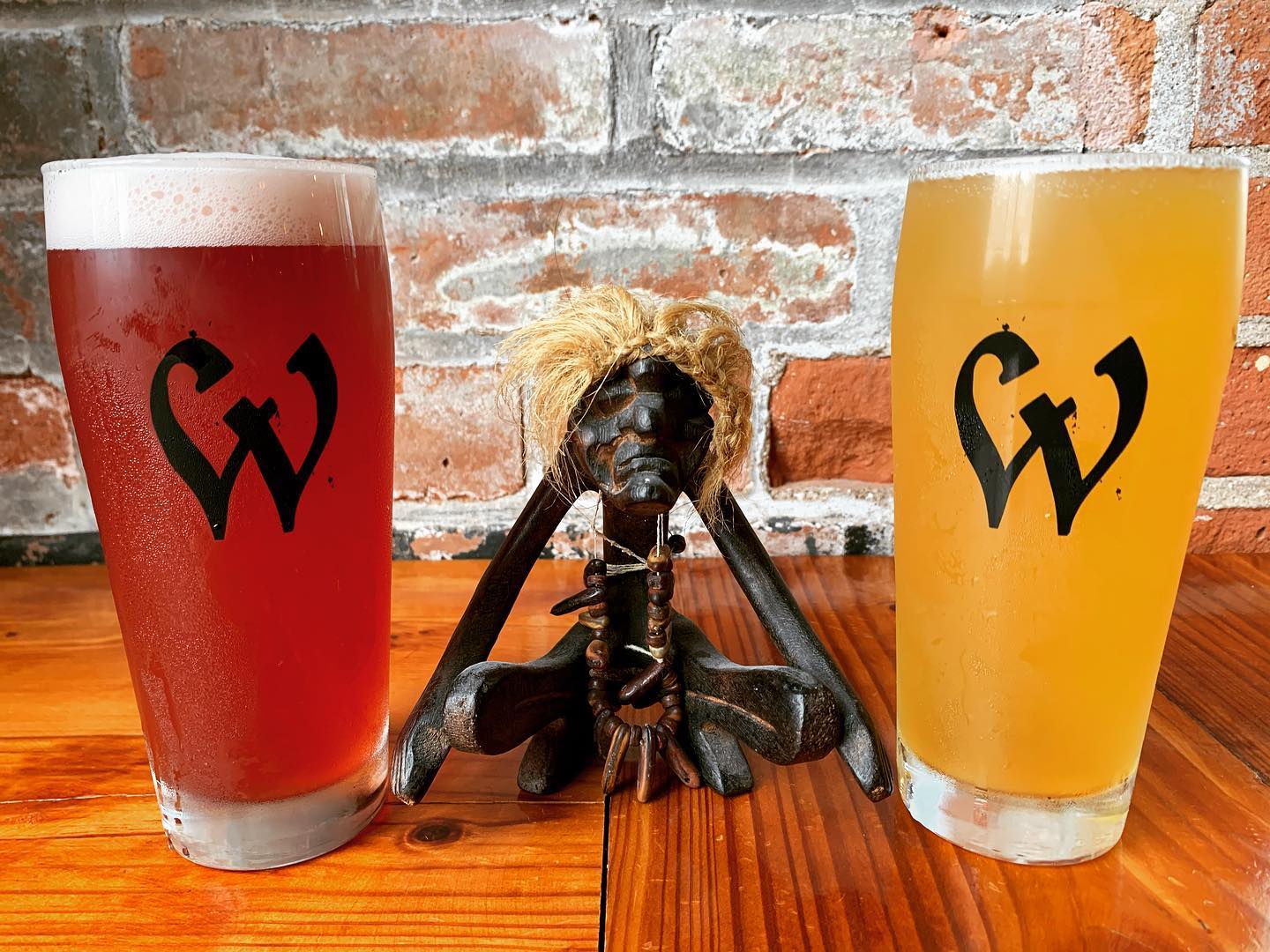 The token Voodoo Guy with two beers